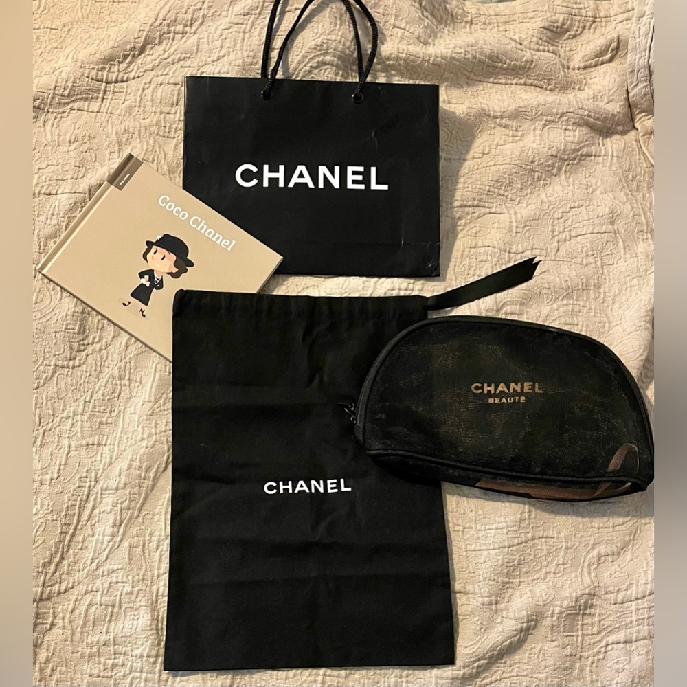 Chanel 3 piece Chanel and a coco Chanel story book.